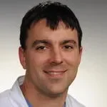 Dr. Aaron M. Giltner, MD