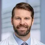Dr. Aaron P. Tracy, MD