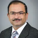 Dr. Abhay Ashok Divekar, MD