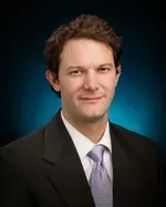 Dr. Adam Reid, MD