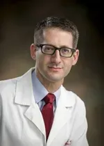 Dr. Adam Vogel