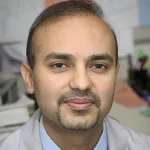 Dr. Adil Alavi, MD