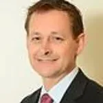 Dr. Alan M. Martinez, MD