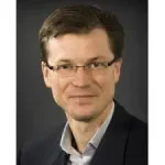 Dr Alexis M. Demopoulos