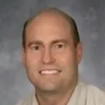 Dr. Andrew David Burrell