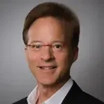 Dr. Andrew J. Grade, MD