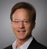 Dr. Andrew J. Grade, MD