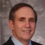 Dr. Andrew J. Packer, MD