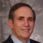 Dr. Andrew J. Packer, MD