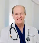 Dr. Bruce E. Fishman, MD