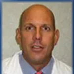 Dr. Bruce A. Huberman, MD