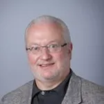 Dr. Carl E. Nuesch, MD