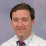 Dr. Carlos A. Rollhauser, MD