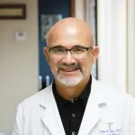 Dr. Carlos E. Vaca, MD