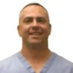 Dr. Christian John Mangin