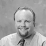 Dr. Christopher John Ash, DO