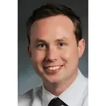 Dr. Christopher J. Clarke, MD