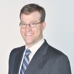 Dr. Christopher E. Mandigo, MD