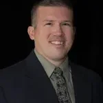 Dr. Christopher B. Means