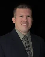 Dr. Christopher B. Means