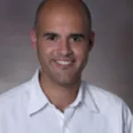 Dr. Clifford Adams Coleman, MD