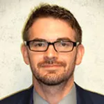 Dr. Clifford M. Houseman, DO