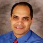 Dr. Corey K. Karimjee