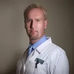 Dr. David Tomasi, 	DSc HC, PhD, MMed