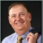 Dr. Dennis E. Halford, DDS