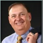 Dr. Dennis E. Halford, DDS