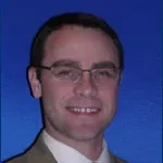 Dr. Gary M. Warburton, MD