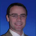 Dr. Gary M. Warburton, MD