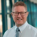 Dr. Gregory E. Buck, MD