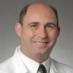 Dr. Guy Abraham Ravad, MD