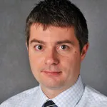 Dr. Hans Stelmach, MD