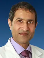 Dr. Inder Singal
