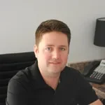 Dr. James W. Thompson