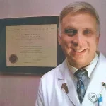 Dr. Jeffrey E. Miller, MD