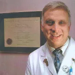 Dr. Jeffrey E. Miller, MD