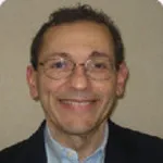 Dr. John James Caravolas