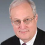 Dr. John Edward Champion, MD