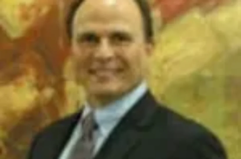 Dr. John Lyall Couvaras, MD