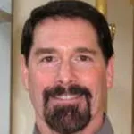 Dr. Jonathan Lewis Caine, MD