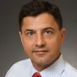 Dr. Joshua Joseph Raymond, MD