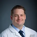 Dr. Justin Keith Arnold