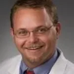 Dr. Justin N. Baker, MD