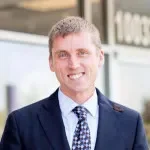 Dr. Justin C. Neibauer