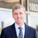 Dr. Justin C. Neibauer