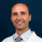 Dr. Justin Kuhns Spooner, MD