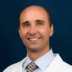 Dr. Justin Kuhns Spooner, MD